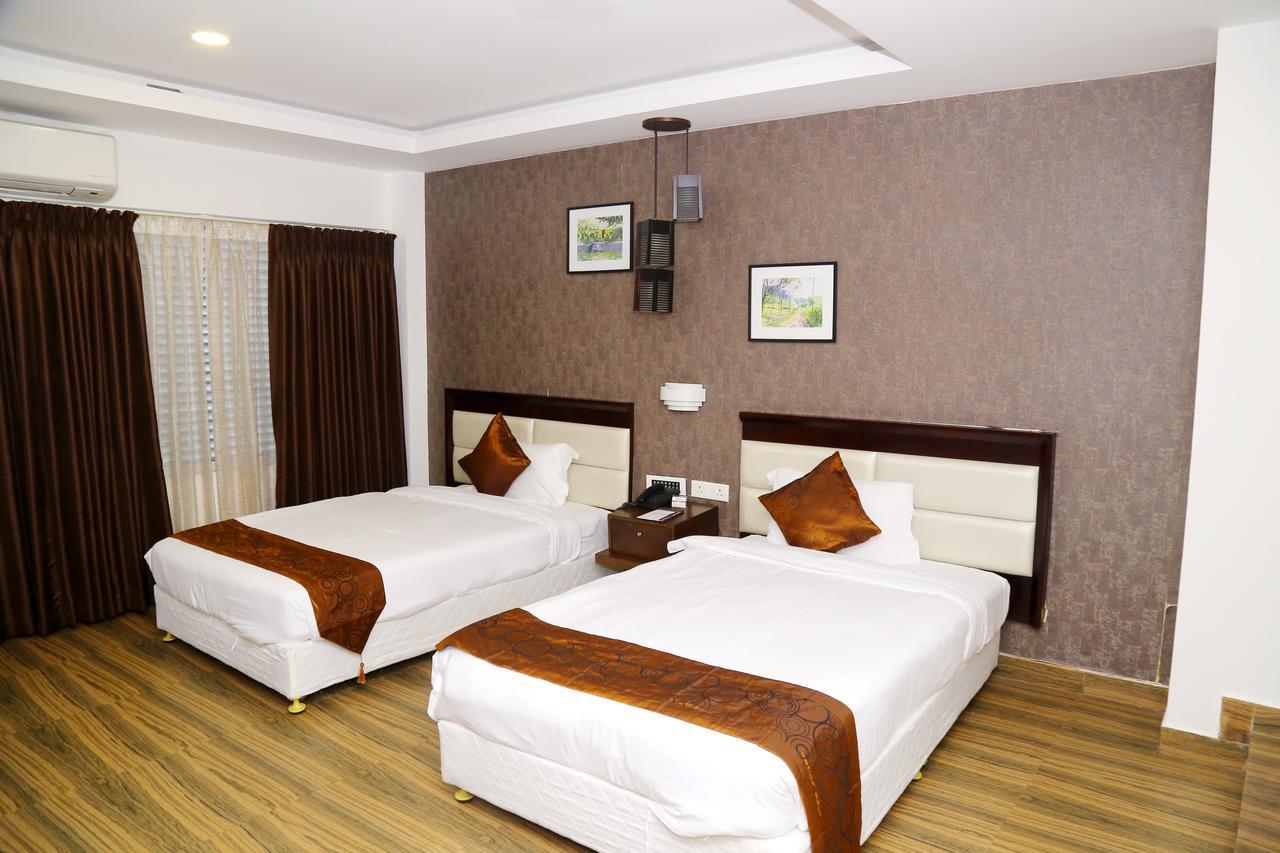 Kga Elite Continental Hotel Tiruvalla Eksteriør billede